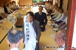 祇園祭三若の吉符入り : 新しく参与を委嘱された男衆に襷を授与